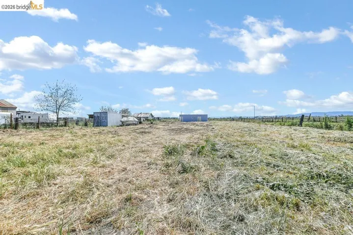 View of yard with a view of rural / pastoral area