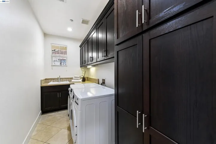 UPSTAIRS LAUNDRY WITH SINK