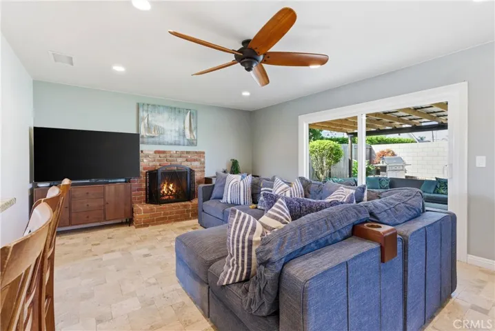 Welcoming living room with sliding door to back patio