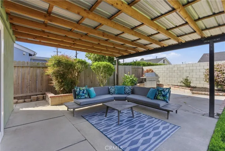 Enjoy coastal living under this covered backyard patio
