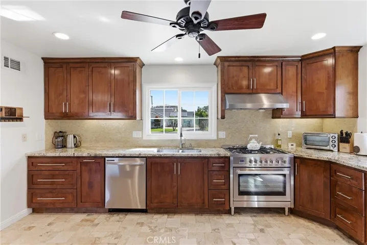 Stunning kitchen with warm wood cabinetry