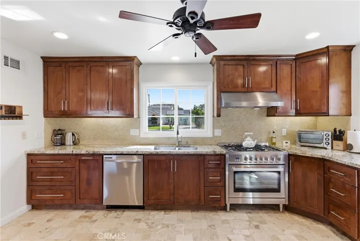Stunning kitchen with warm wood cabinetry