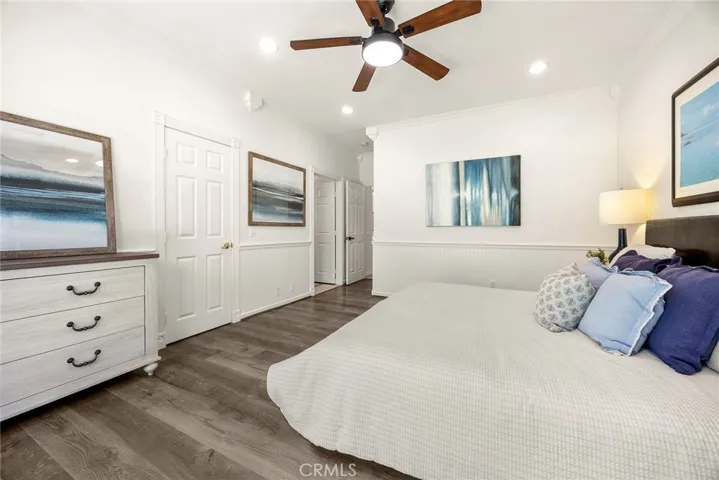 Primary bedroom view toward a spacious walk-in storage closet, perfect for keeping everyday essentials organized and within reach.