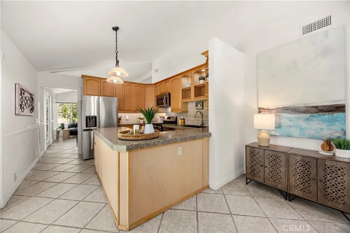 Not only is the kitchen spacious but it has a special and perfect nook to bring your Pinterest coffee bar ideas to life.