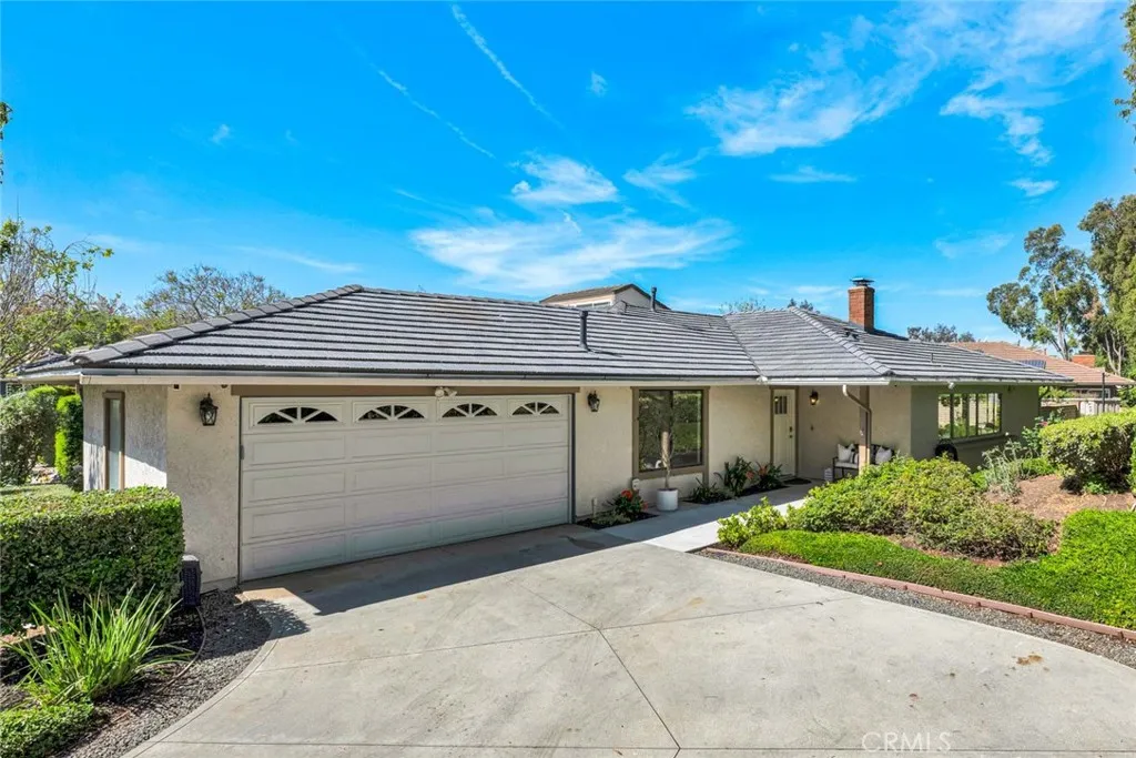 Welcome home! Extra large driveway.