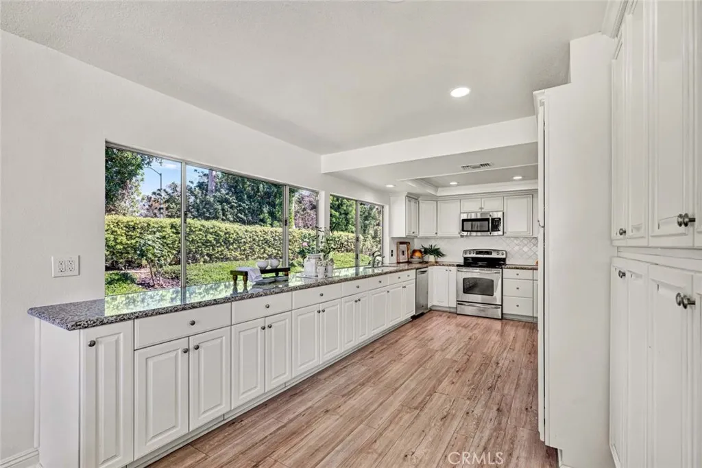 Updated kitchen. Tons of storage and natural light.