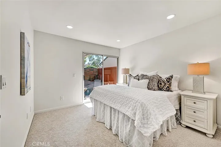 Secondary bedroom with private patio.