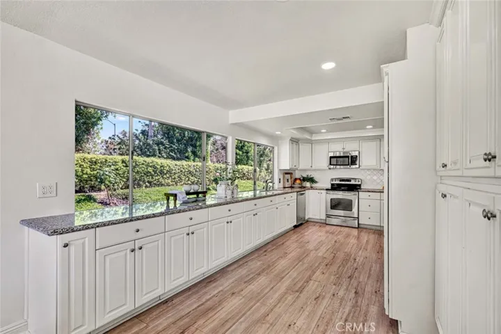 Updated kitchen. Tons of storage and natural light.