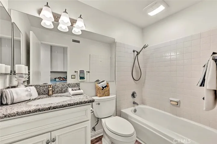 Full bath in hallway.