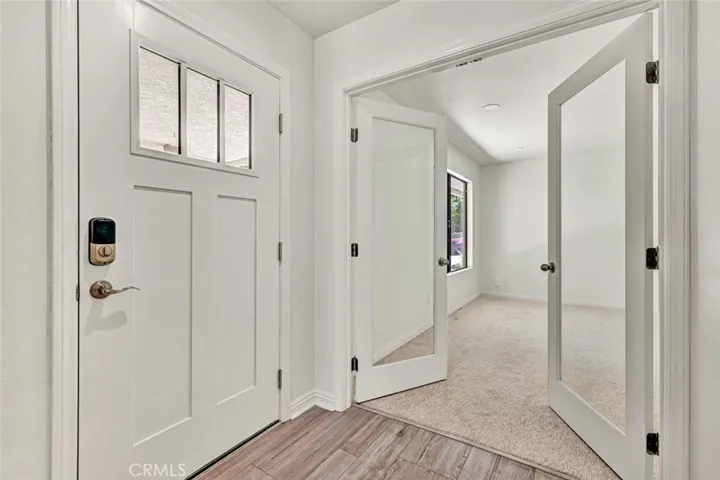 Secondary bedroom with double French doors.