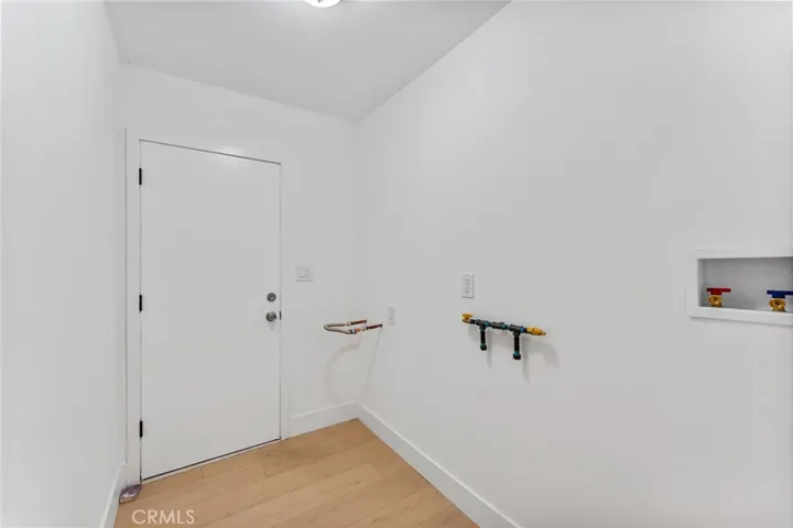 Inside laundry room.