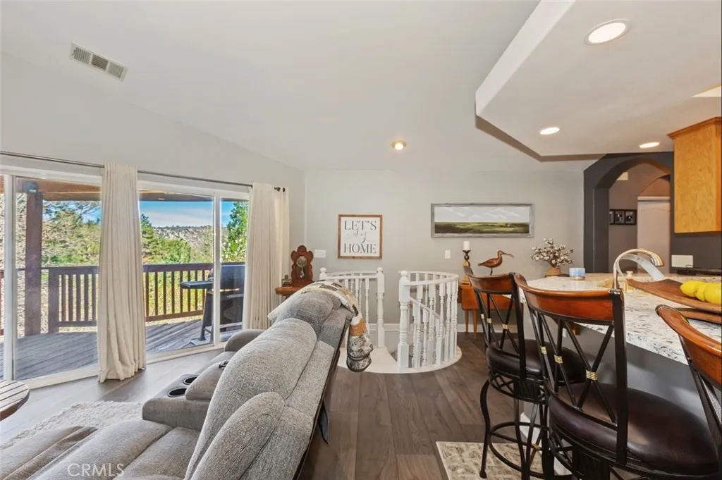 Deck off of family room and connects to Primary bedroom.  Access to ground floor.
