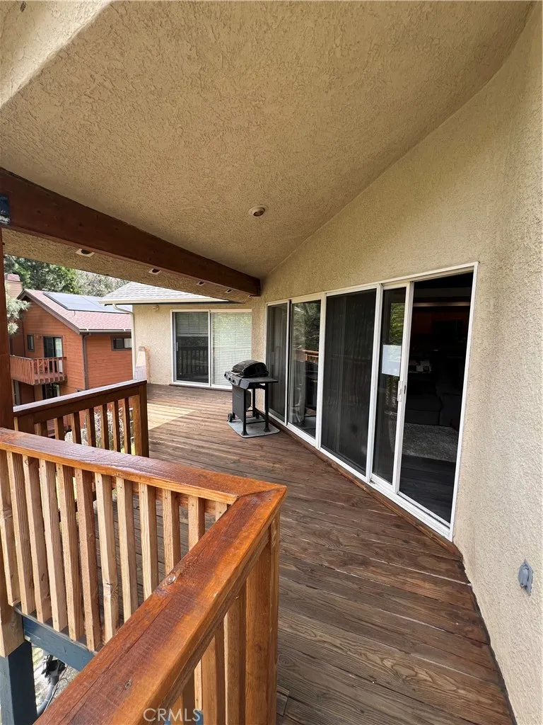 Outside the main floor family room and primary bedroom.