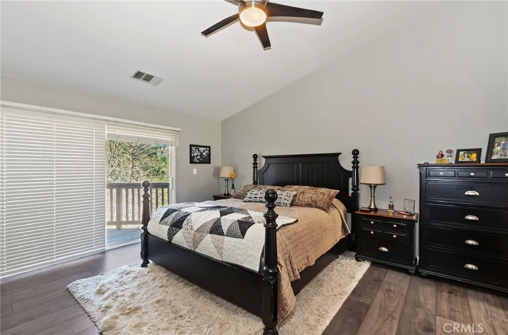 Deck leads to ground level. Nice size room with ceiling fan.