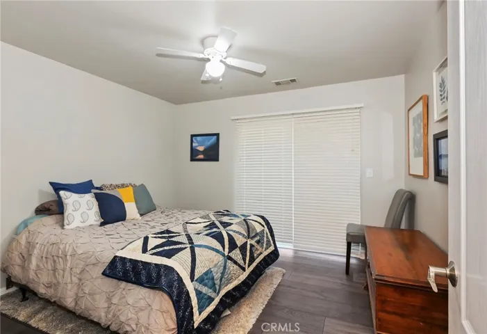 Second bedroom on main floor.  Private deck that connects to the family room.