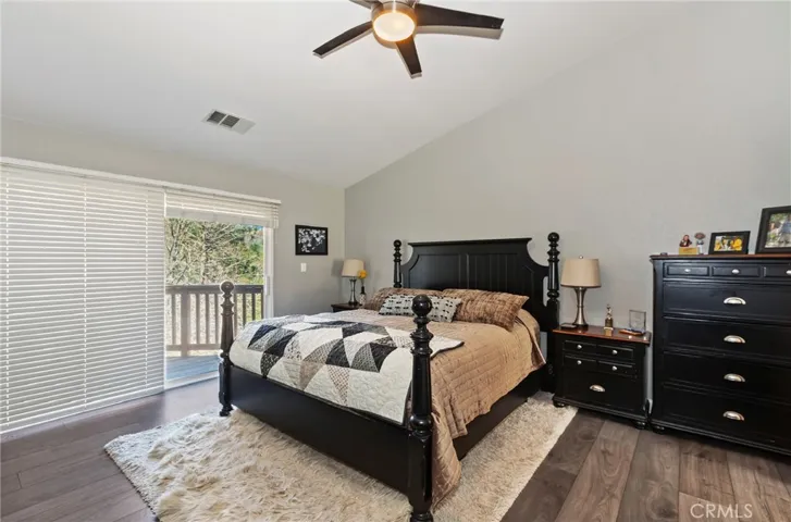 Deck leads to ground level. Nice size room with ceiling fan.