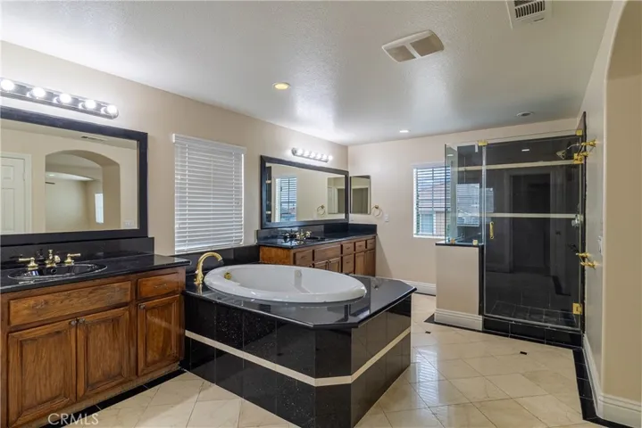 Primary  soak in tub & shower