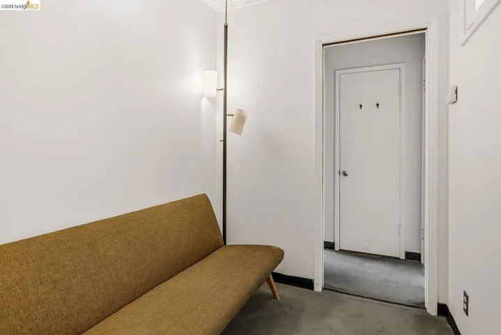 Hallway featuring carpet floors