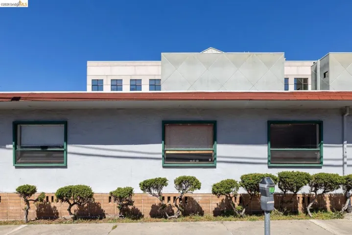 View of front facade featuring stucco siding