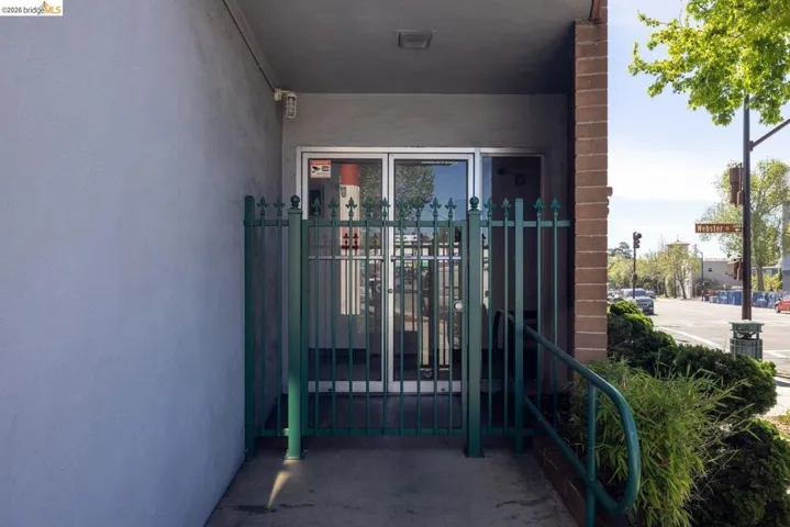 View of exterior entry with stucco siding