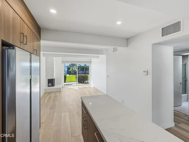 pic 5 (kitchen island view to living rm