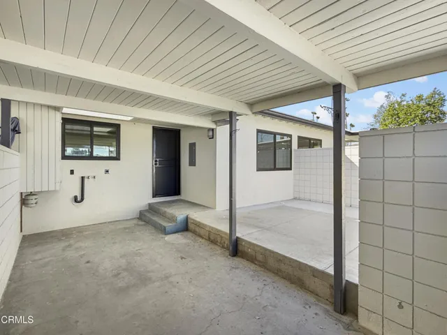 pic 3 (carport w-d hookups & patio)