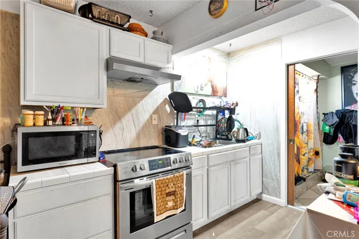 Back - 1 bedroom unit kitchen
