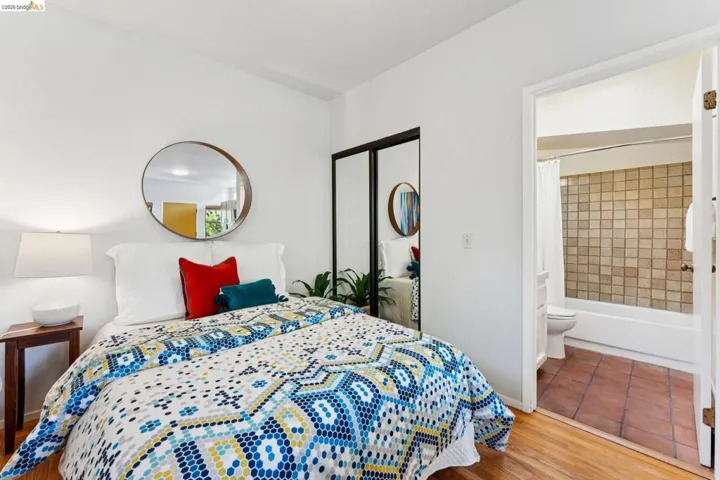 Bedroom featuring a closet and light wood-type flooring