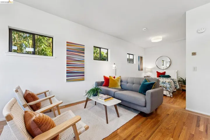 Living area featuring wood finished floors and baseboards