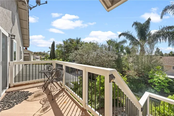 upstairs patio area with stairs leading from bedrooms​​‌​​​​‌​​‌‌​​‌​​​‌‌​​​‌​​‌‌​​‌‌​​‌‌​​​​ downstairs