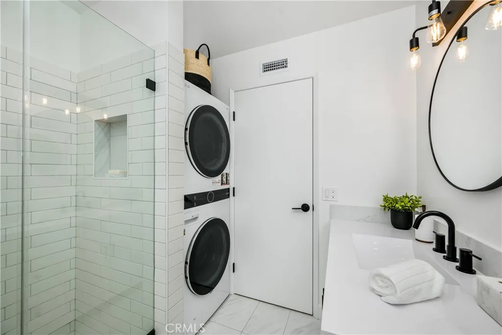 In unit laundry in primary bathroom