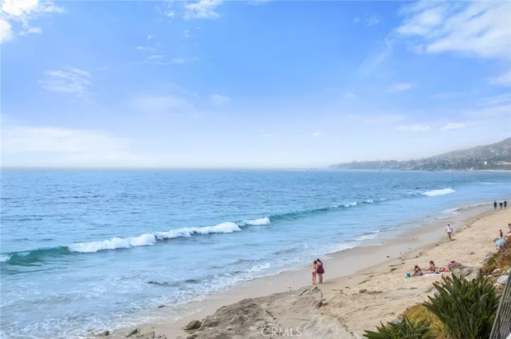 Additional highlights include private gated access to the sand and one dedicated parking space.