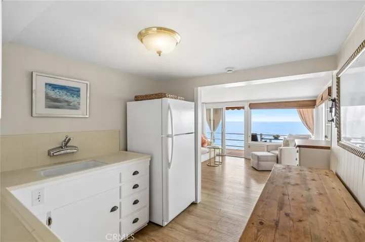 Ideally situated just moments from Laguna’s renowned boutiques, galleries, and restaurants, this residence offers an effortless blend of refined coastal living and vibrant village convenience.

