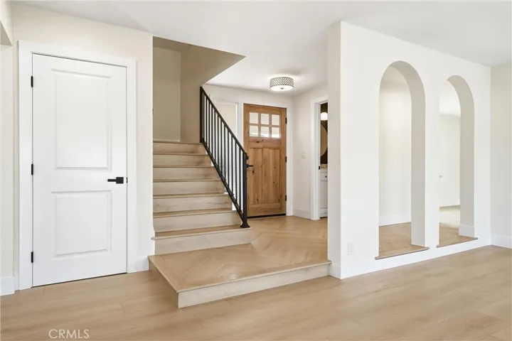 Entry with Herringbone Floor and Arches
