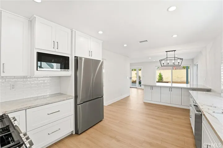 All new appliances with recessed lighting throughout