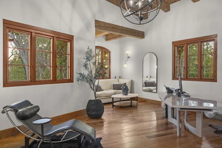 Office ideally positioned off front entry looking out to the beautiful landscape.
