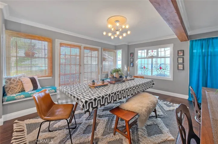 Informal dining area, was used as pool table-recreation space at one time