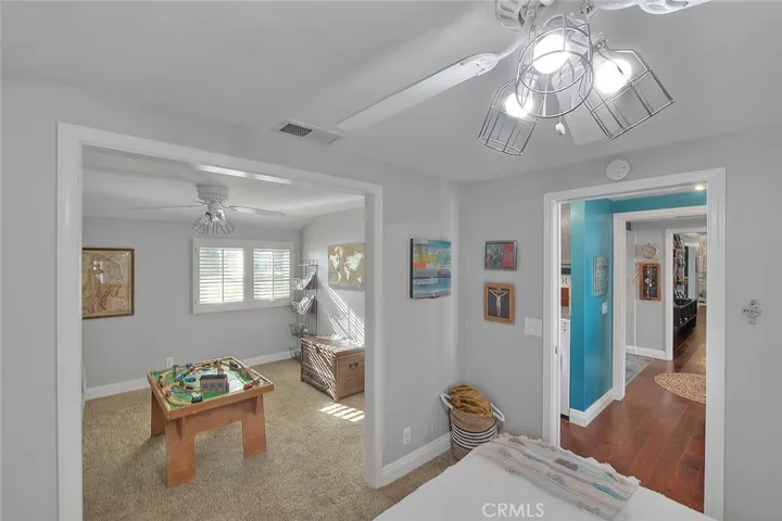 View from bedroom 3 of den to left and hallway to the right