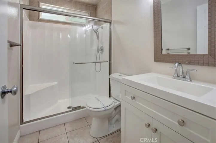 1st floor full bathroom with new vanity, mirror, lighting, faucet, recessed lighting, paint, medicine cabinet - all fresh!