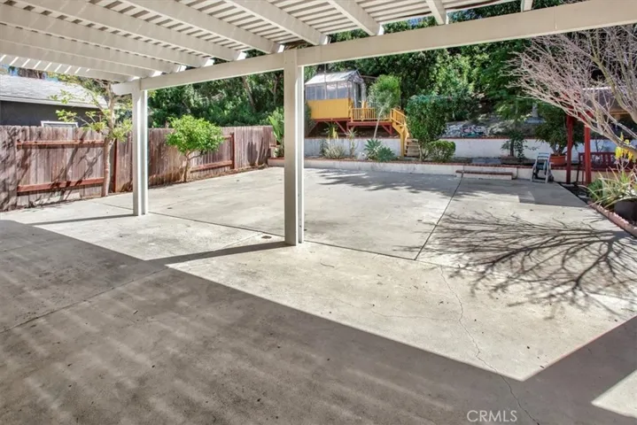 HUGE entertainers back yard - lush landscaping, beautiful hillside view