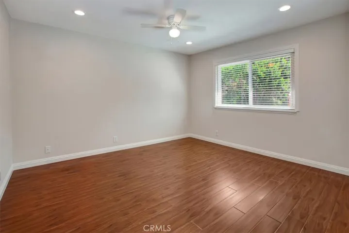 Primary bedroom, 2nd floor back of house overlooking lush back year