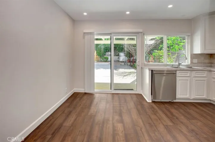 Eat-in country kitchen with slider to back yard and covered patio