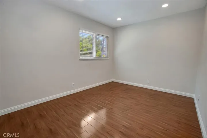 3rd bedroom on second floor - new paint, recessed ighting, window, shelving closet