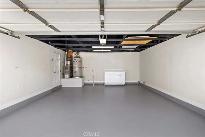 Super clean 2 car garage with painted floors