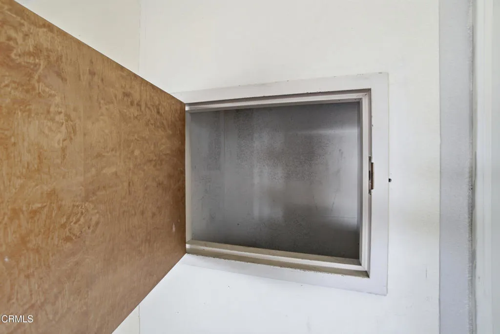 Utility shoot door in garage