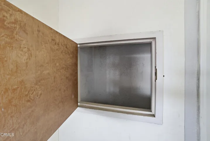 Utility shoot door in garage