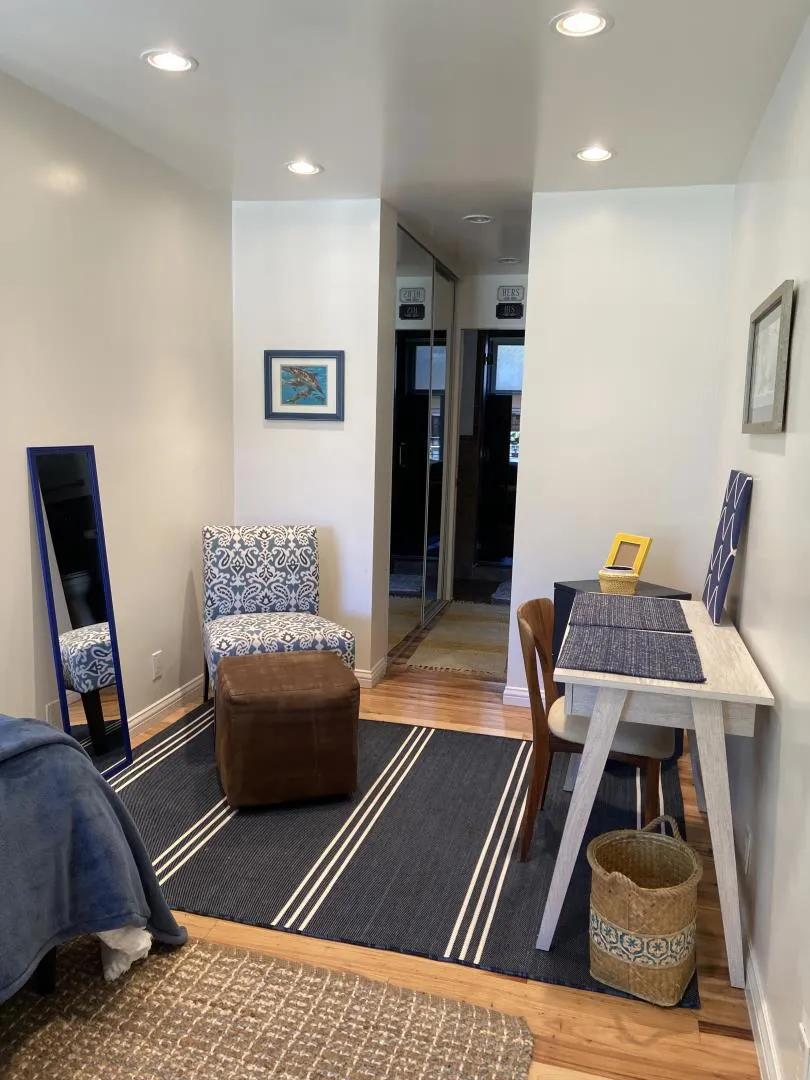 Bonus area, 225 square feet. Washer/dryer in hallway in closet. Bathroom in back with double shower.