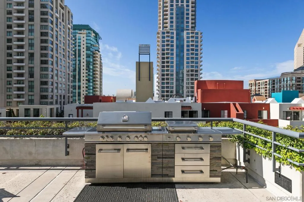 Resort Style Outdoor Heated Pool with spa, cabanas, BBQ's firepit, and lounge areas.