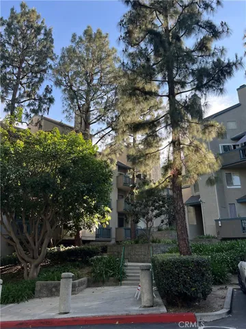 Building exterior with marture trees
