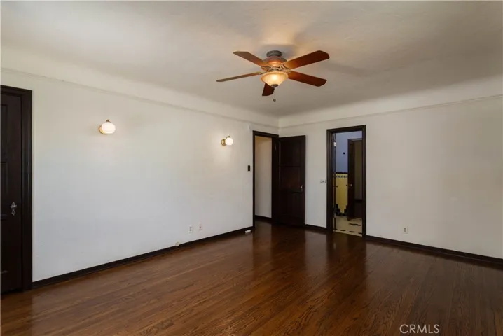 2nd bedroom: view towards full bathroom and hallway